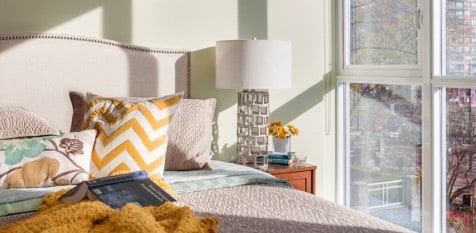 luxurious bedroom with yellow chevron pillow by space harmony