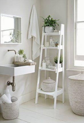 white bathroom with plants